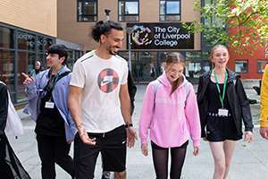 - young people walking together on campus